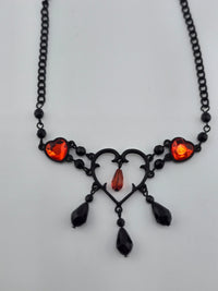 NK-Blk/Red Multi Heart Dangle