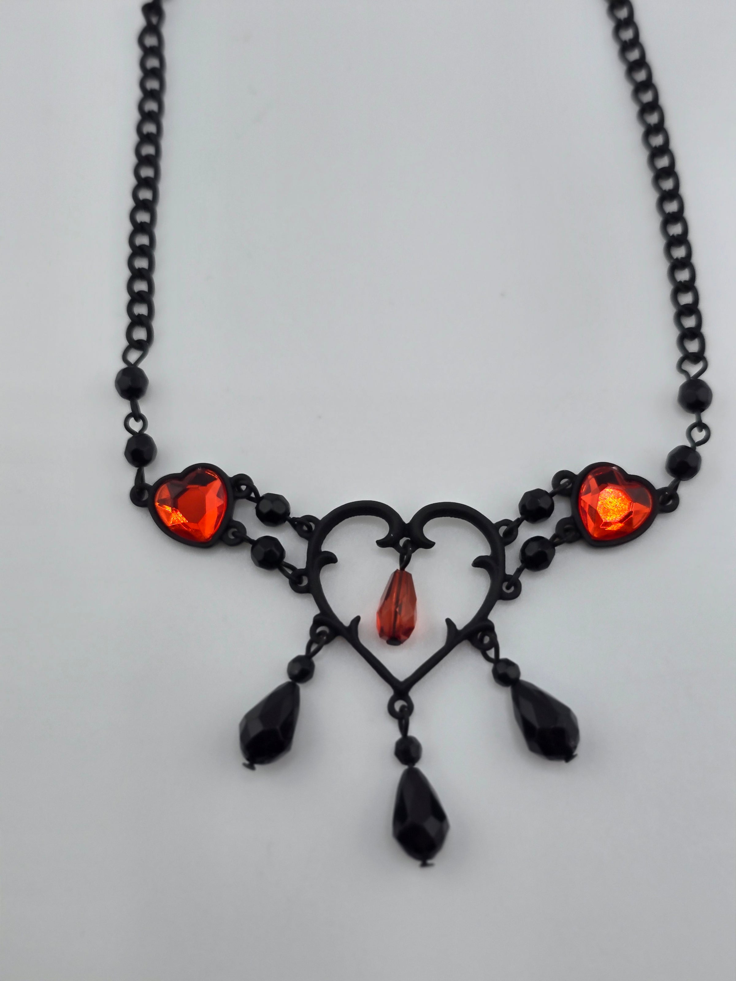 NK-Blk/Red Multi Heart Dangle