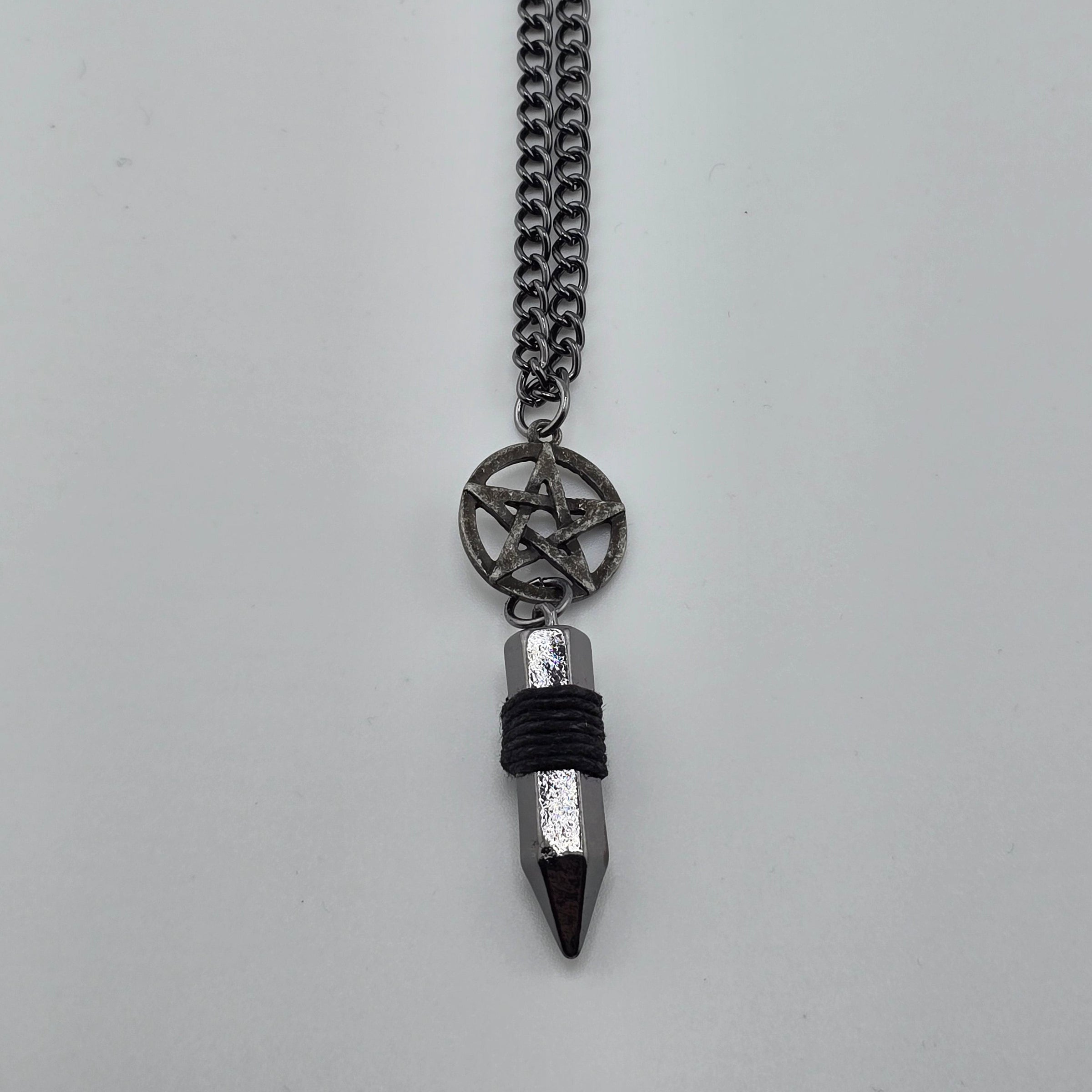 NK-Pentacle w/wrapped blk cryst